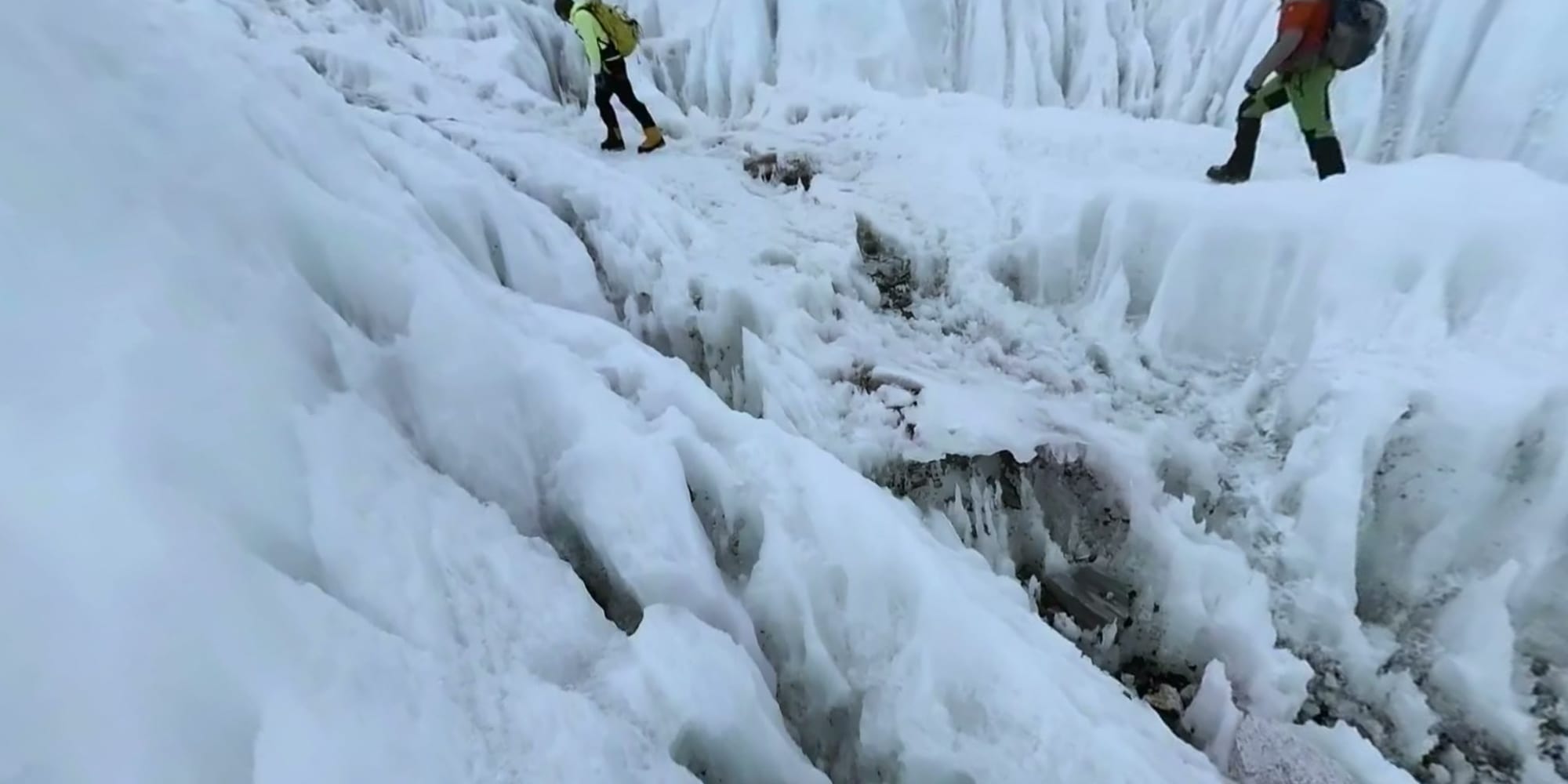 Climbers moving through the Khumbu Icefall