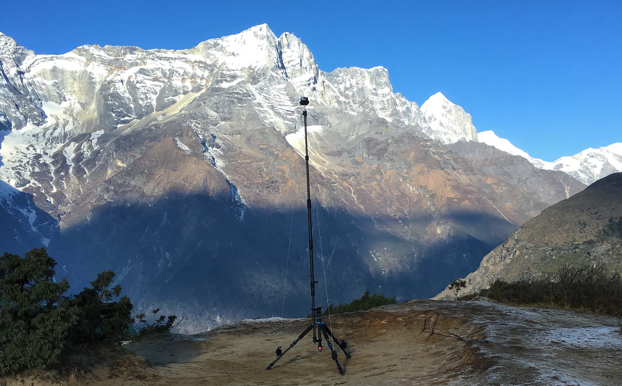 A capture rig on its tripod below the Himalayan ridgeline