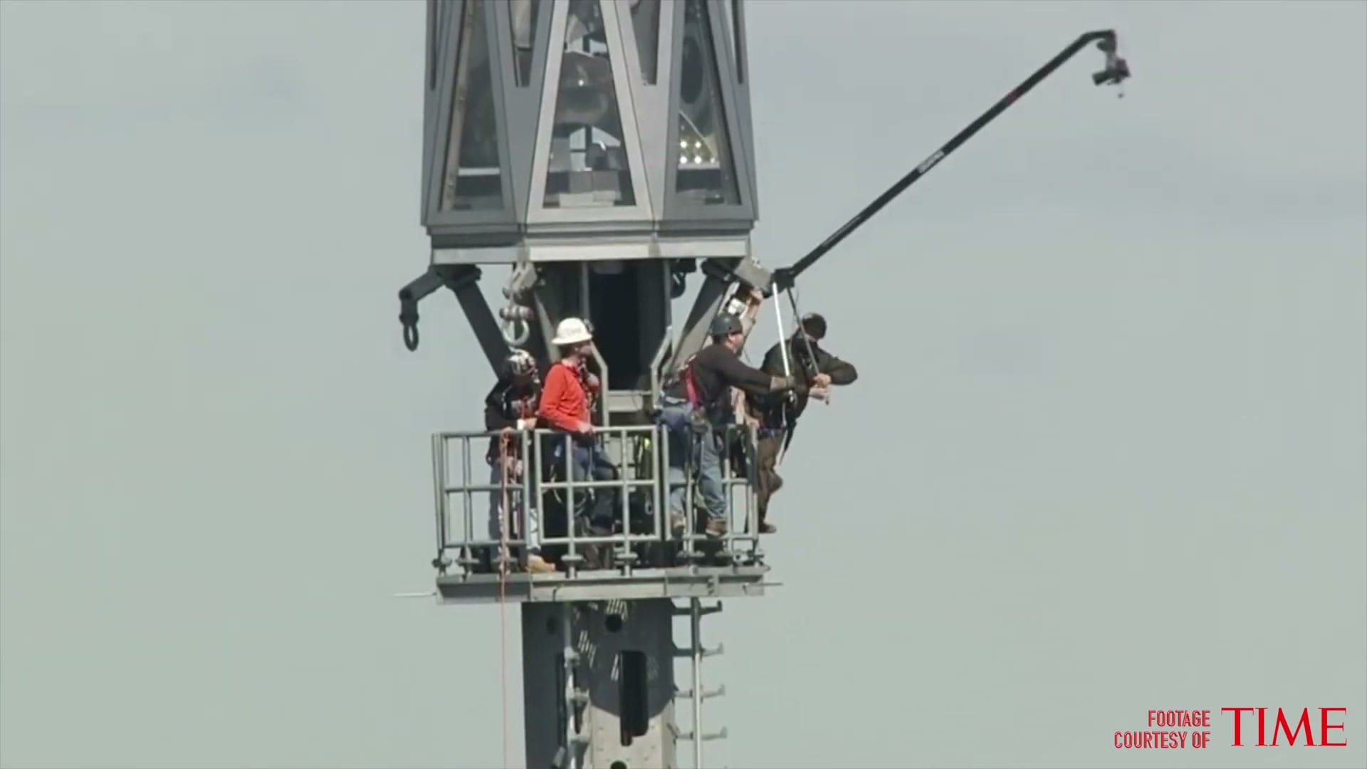 The camera rig on its arm off the spire of One World Trade Center
